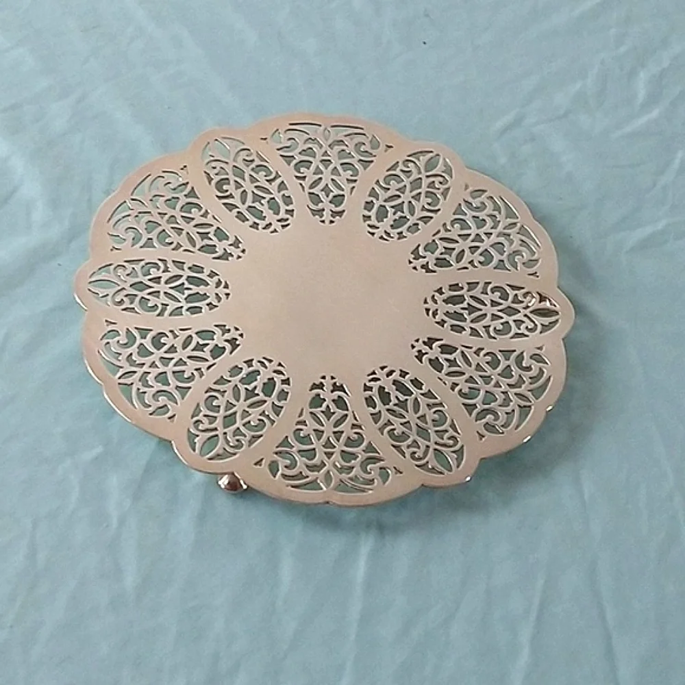 Vintage Rogers footed silver plate trivet